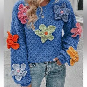 Knit sweater. Women’s Small. Fits like picture. Fun flowers attached.